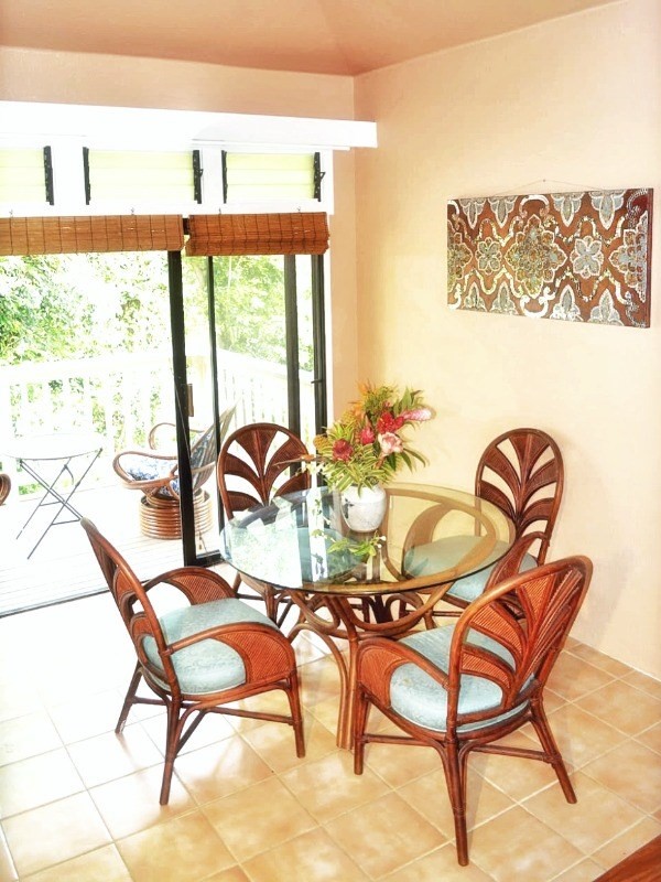 4480 Ka Haku Road, Unit 208 Princeville, HI 96722 - Photo 3 of 28 a view of a dining room with furniture and window