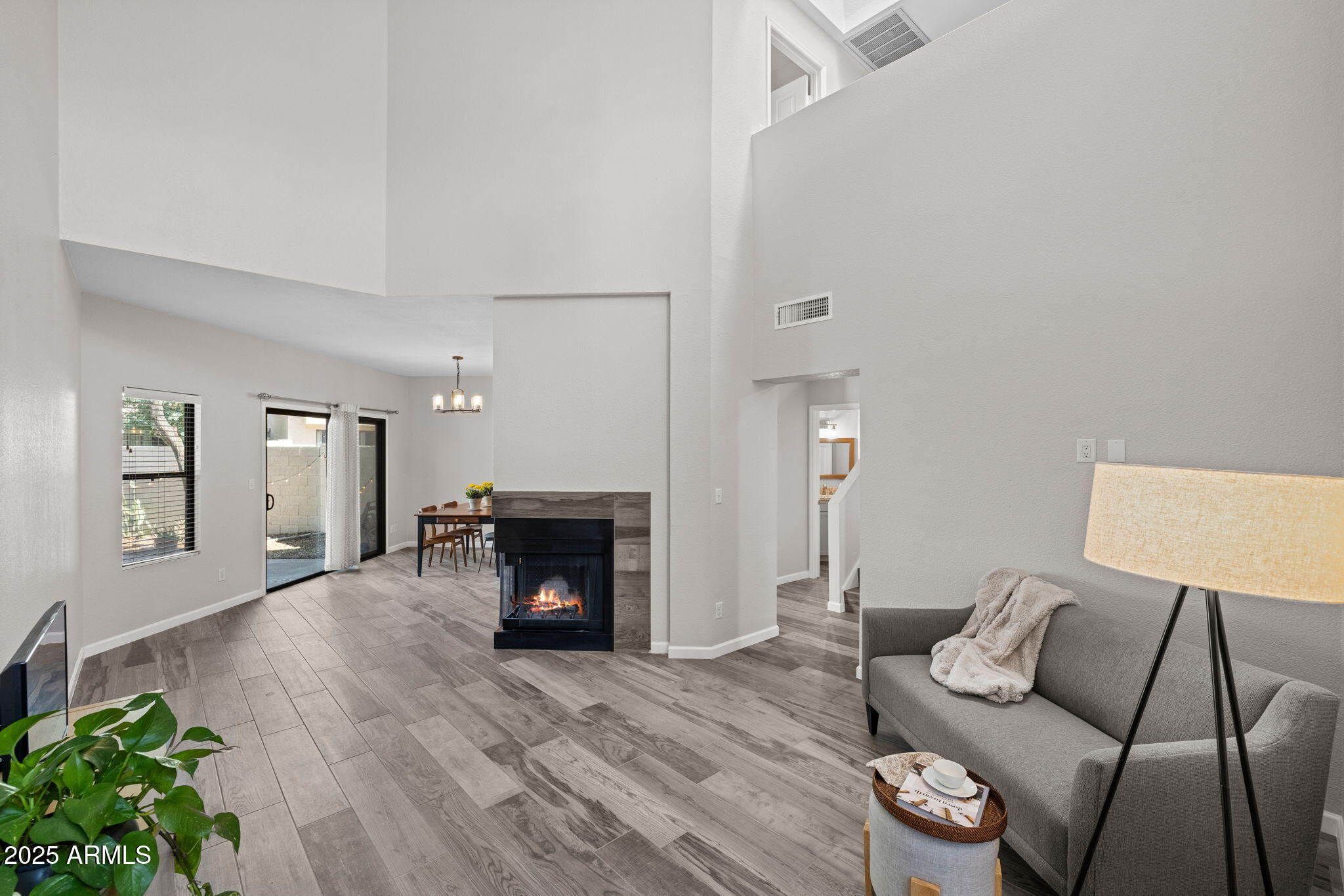 1060 East Louis Way Tempe, AZ 85284 - Photo 3 of 38 Wood-look tile throughout lower level