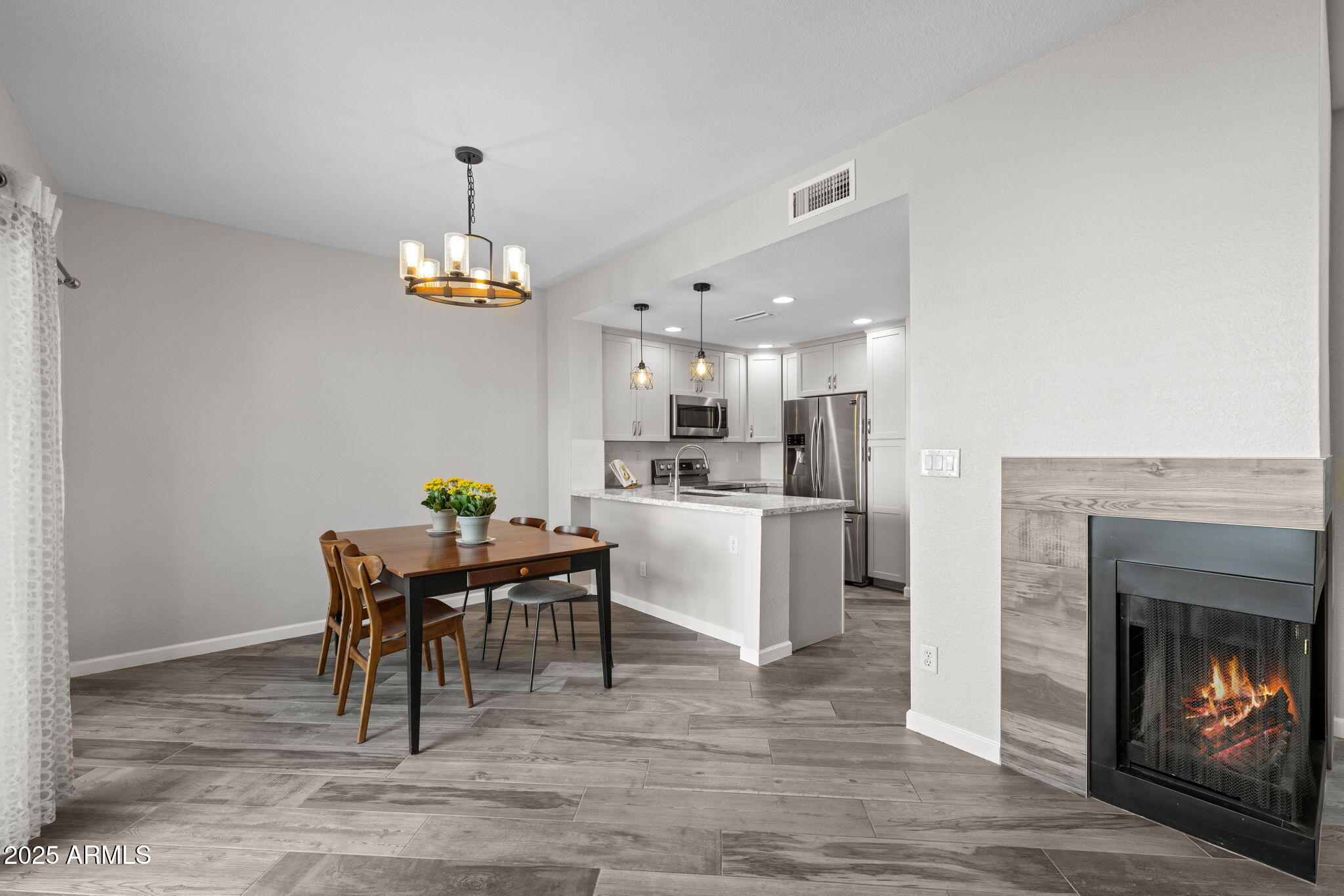 1060 East Louis Way Tempe, AZ 85284 - Photo 5 of 38 Enjoy a 2-sided fire view