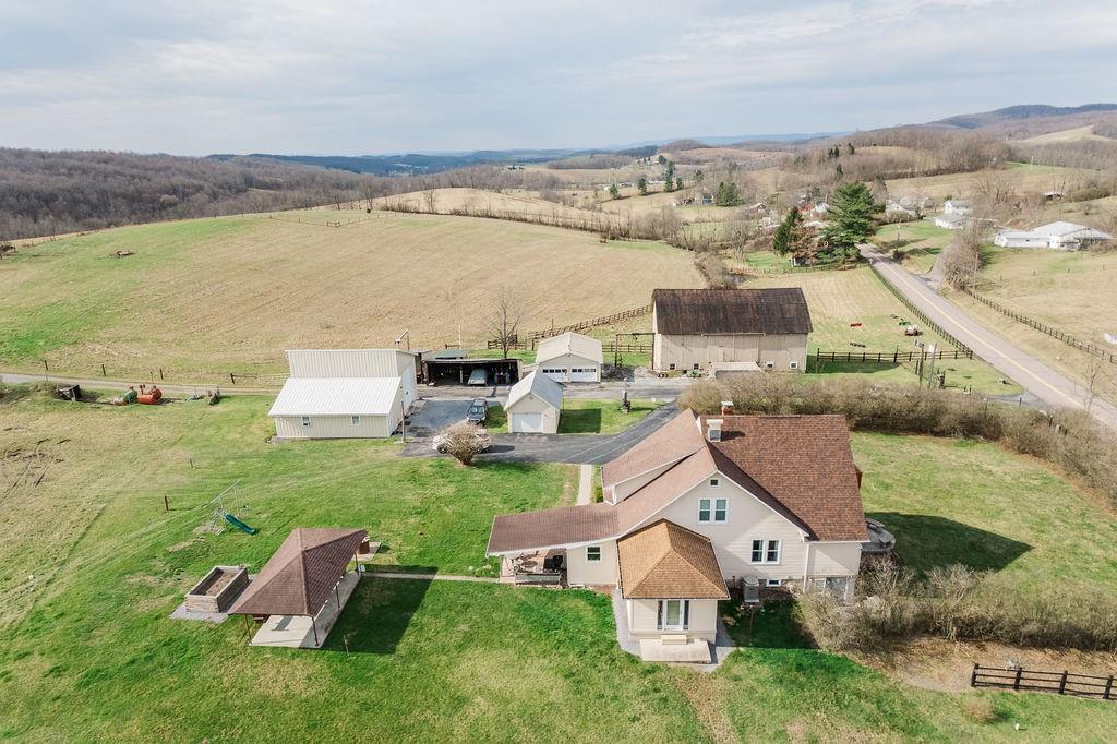 1898 Schellsburg Road Claysburg, PA 16625 - Photo 15 of 50 an aerial view of a house with outdoor space and lake view