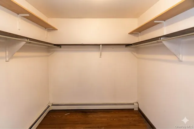 a view of a room with racks on the wall
