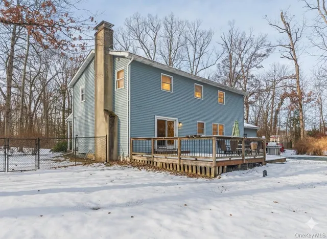 a view of a house with a large window