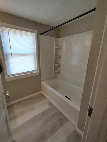 a bathroom with a toilet and a sink