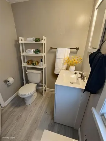 a bathroom with a toilet and a sink