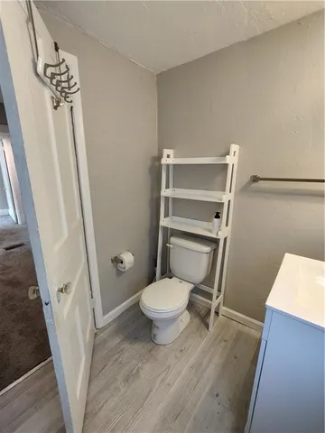 a view of a hallway with a large window