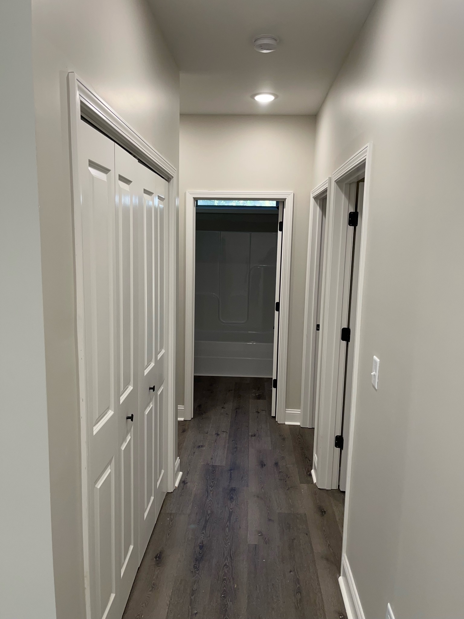 9970 West Green Cemetery Road Bon Aqua, TN 37025 - Photo 4 of 8 wooden floor in an empty room