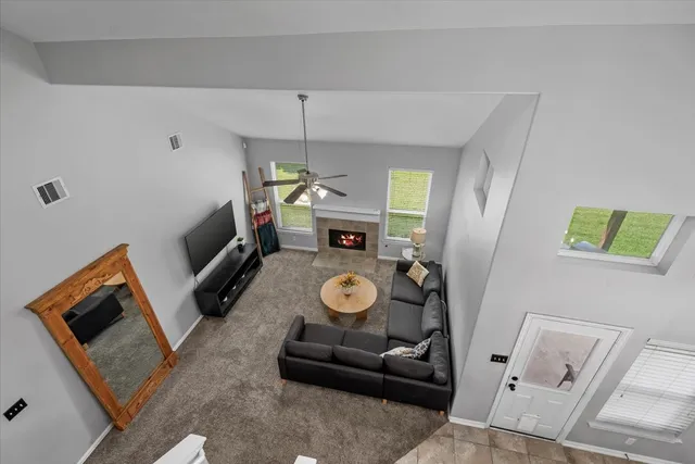 a view of living room with furniture and a table