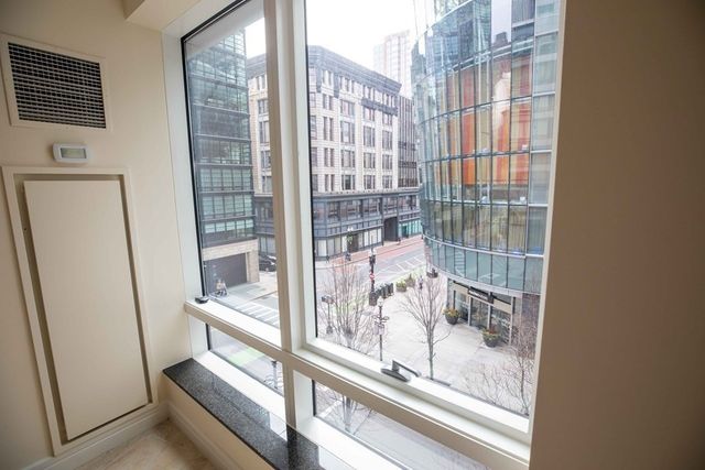 a view of a balcony with wooden floor