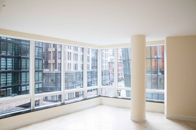 a view of an empty room and window