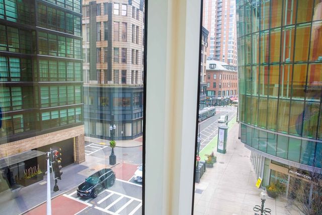 a balcony with a book shelf