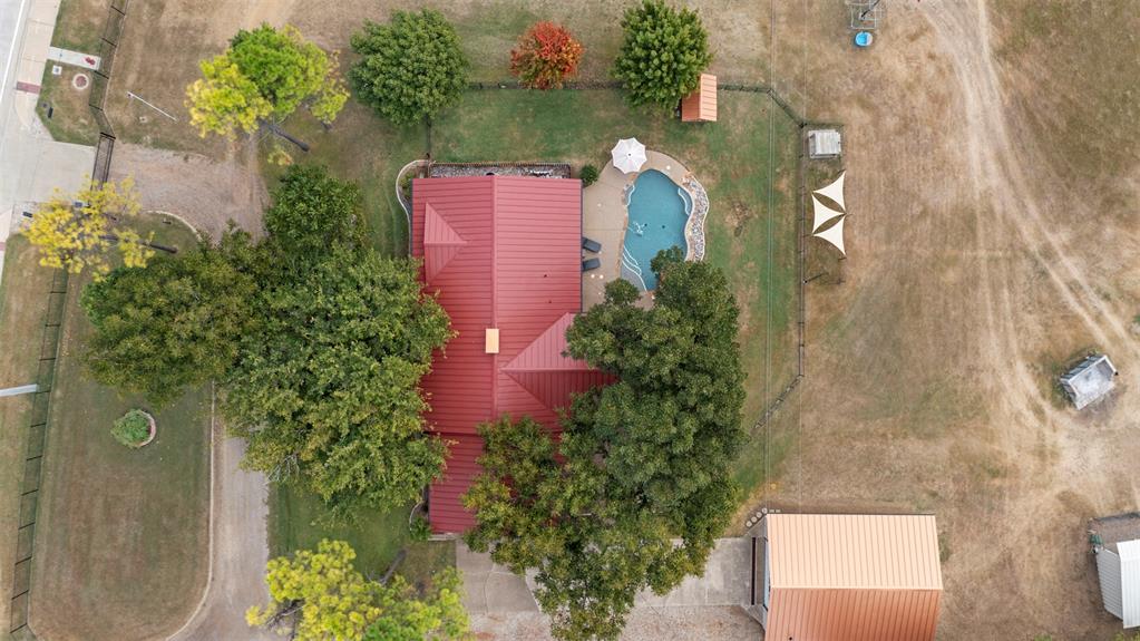 1009 West Interstate 20 Grand Prairie, TX 75052 - Photo 38 of 40 an aerial view of a house with a yard and garden