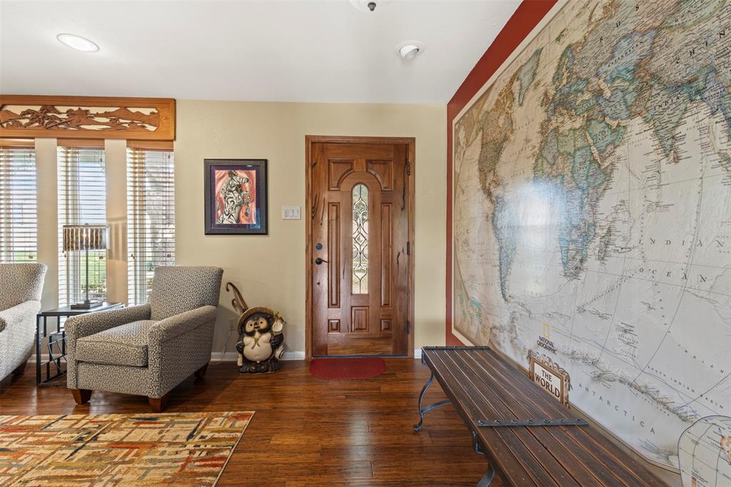 1009 West Interstate 20 Grand Prairie, TX 75052 - Photo 5 of 40 a living room with furniture and a fireplace