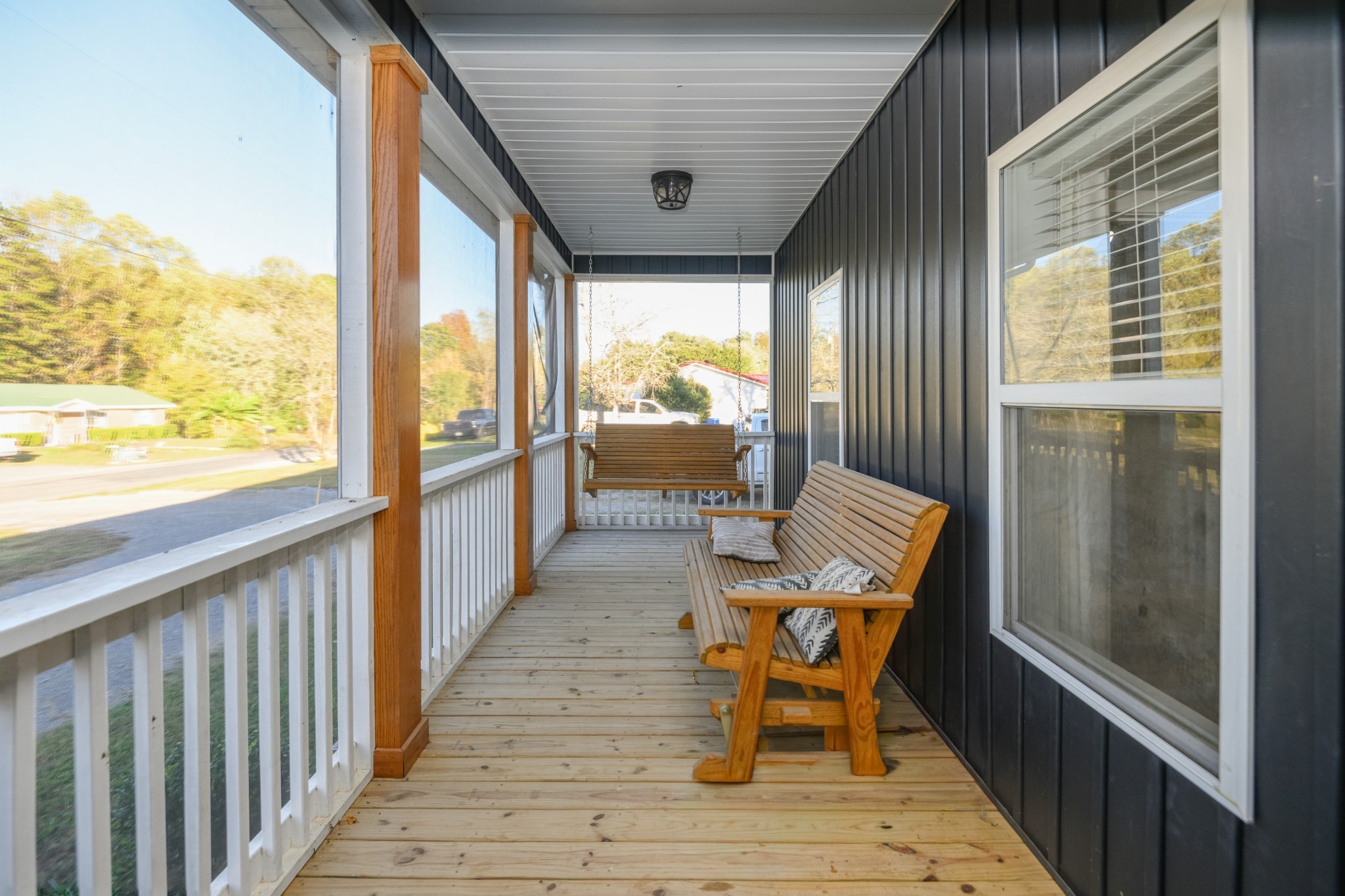 838 Old W Point Road Smithville, TN 37166 - Photo 14 of 65 a balcony with chairs and wooden floor
