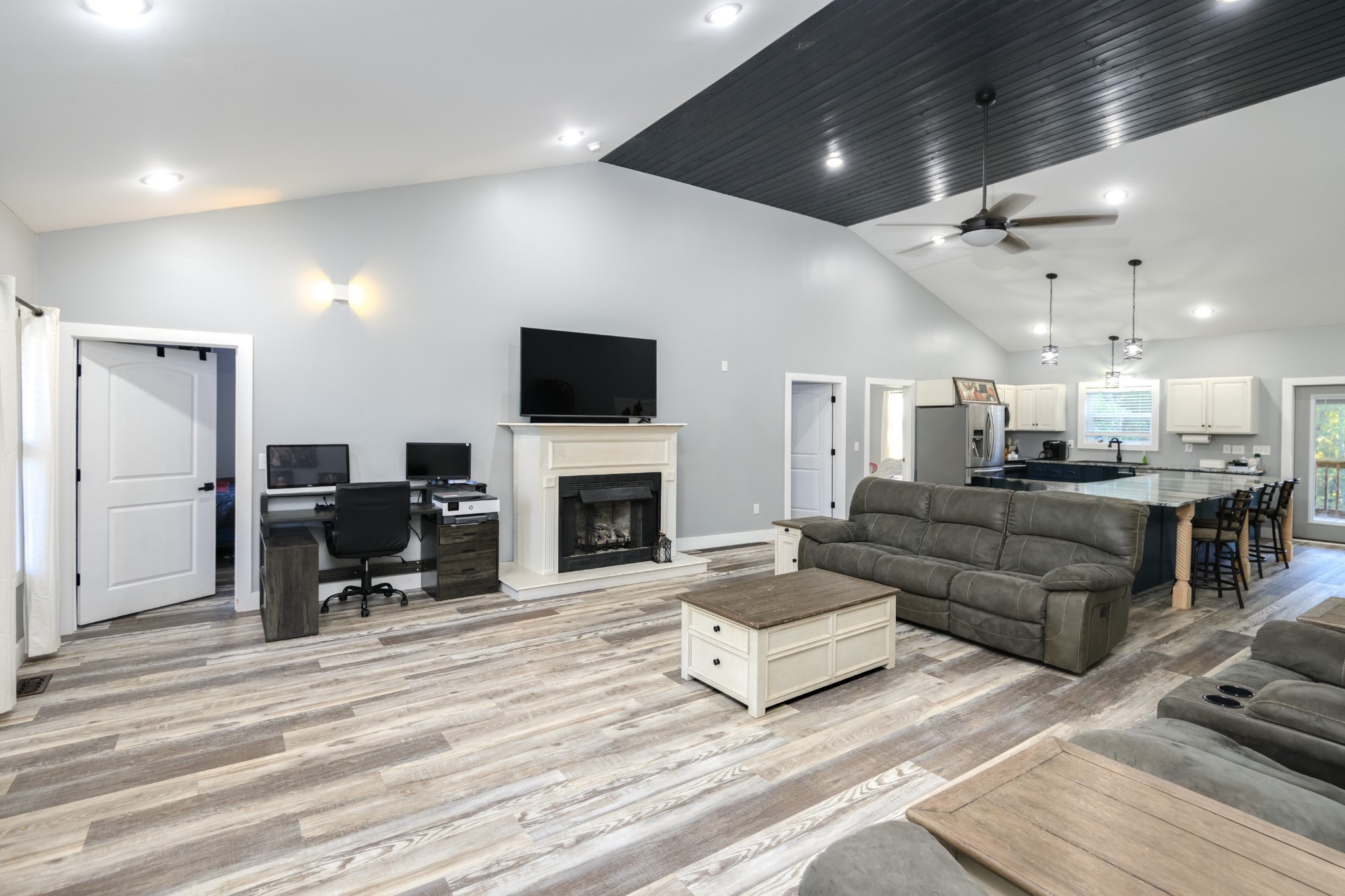838 Old W Point Road Smithville, TN 37166 - Photo 20 of 65 a living room with furniture and a fireplace