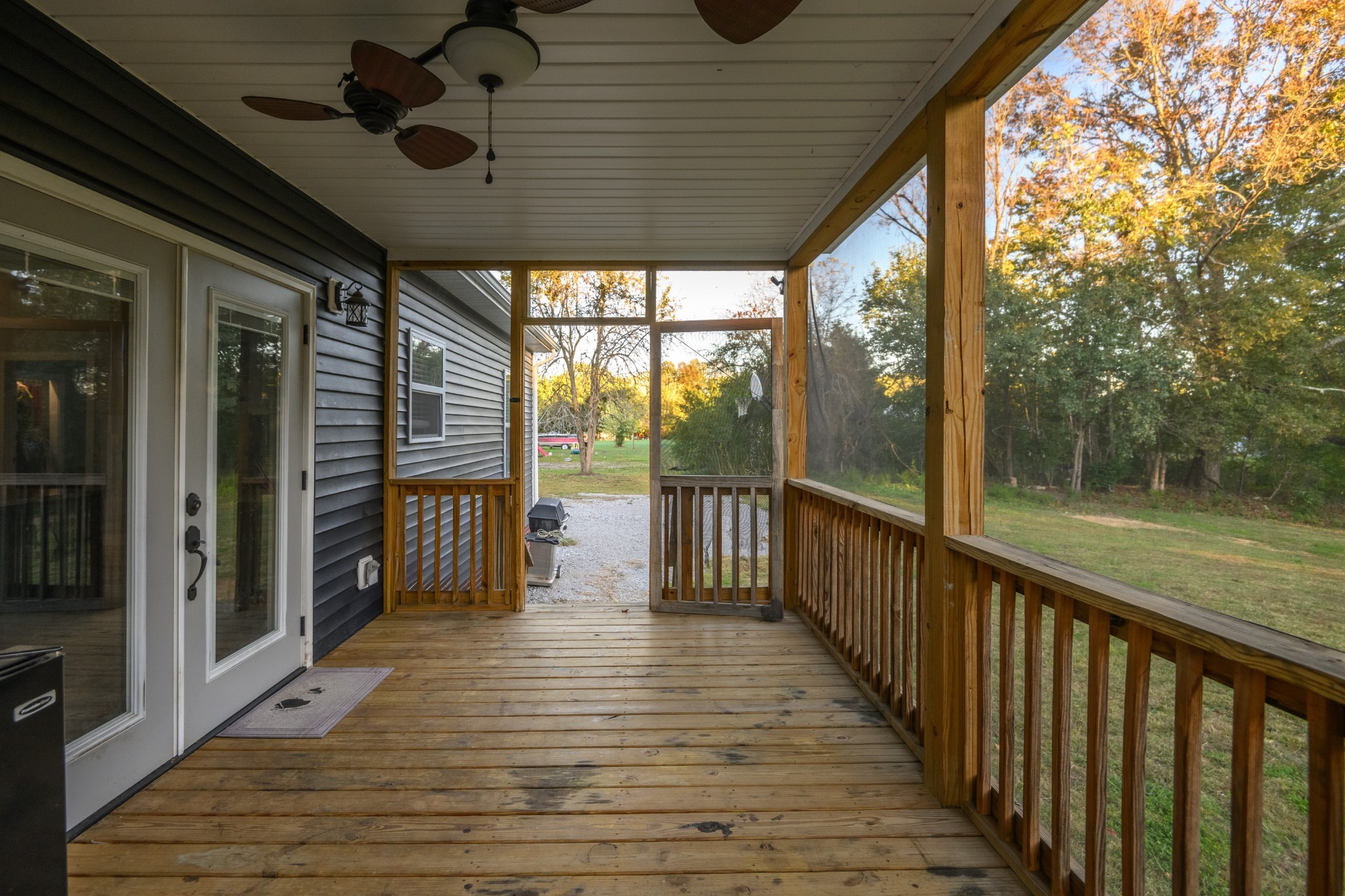 838 Old W Point Road Smithville, TN 37166 - Photo 30 of 65 a view of a porch with wooden floor and iron stairs
