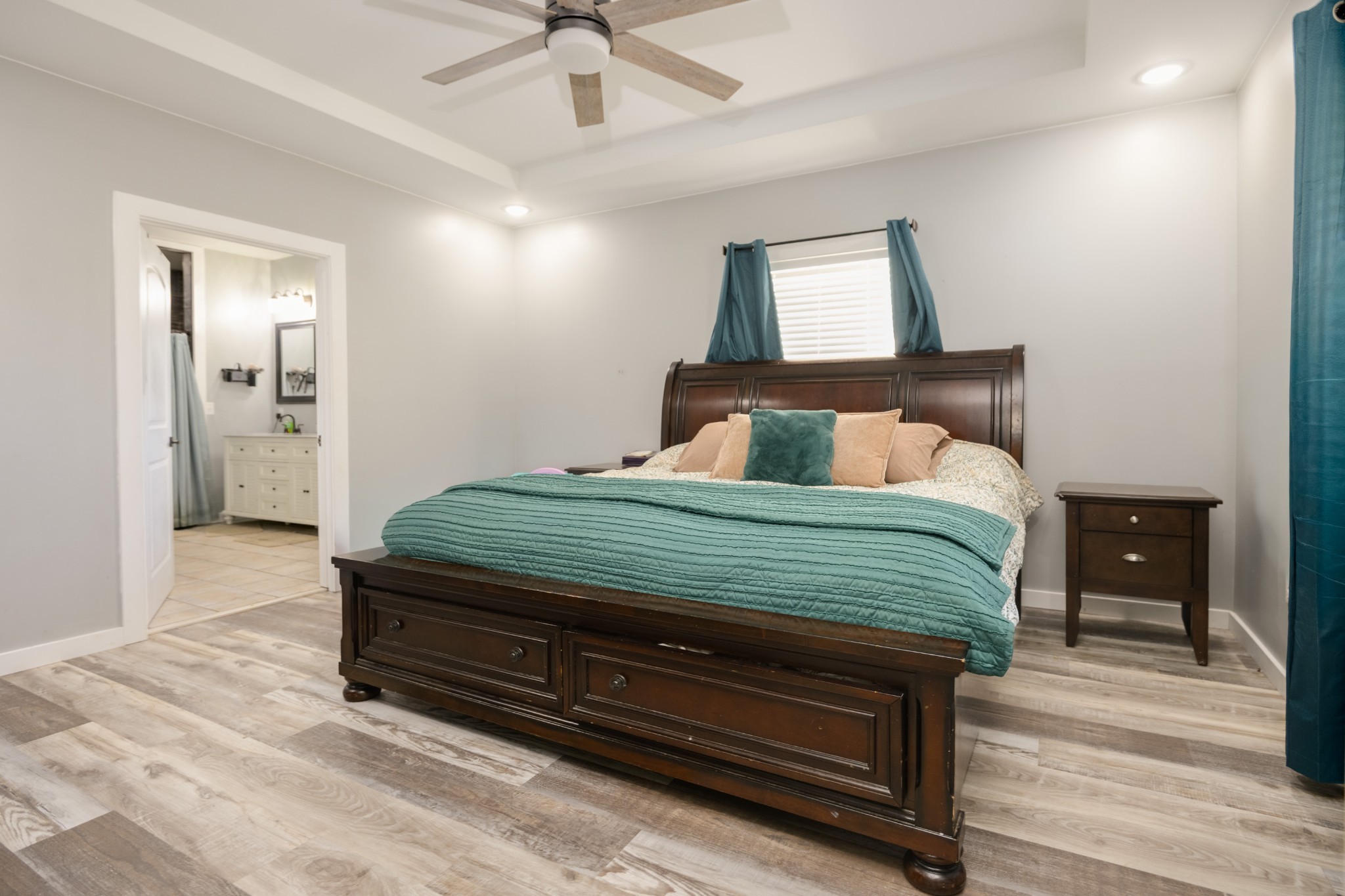 838 Old W Point Road Smithville, TN 37166 - Photo 32 of 65 a bedroom with a bed and a chandelier