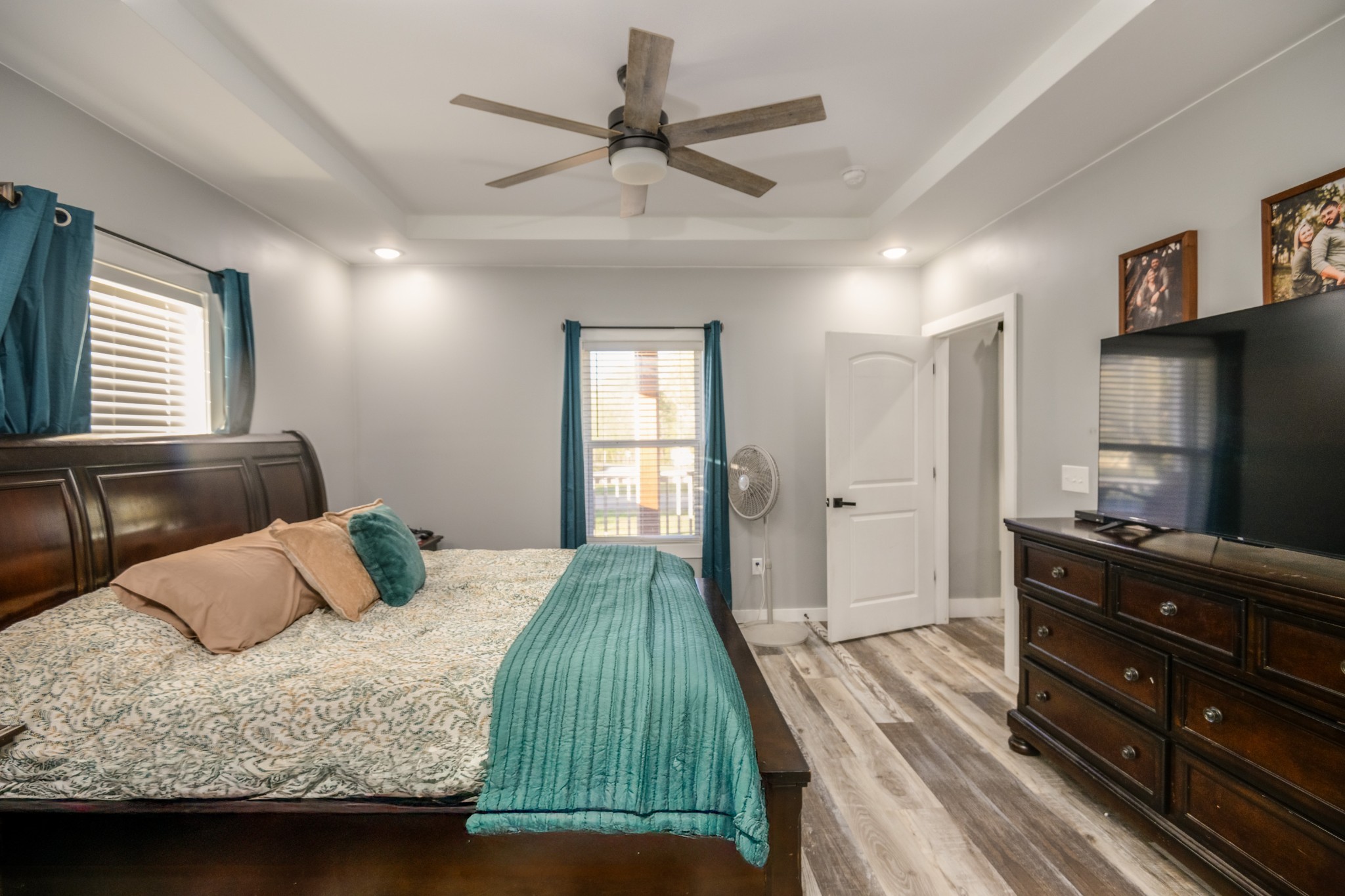 838 Old W Point Road Smithville, TN 37166 - Photo 33 of 65 a bedroom with a bed and a flat screen tv