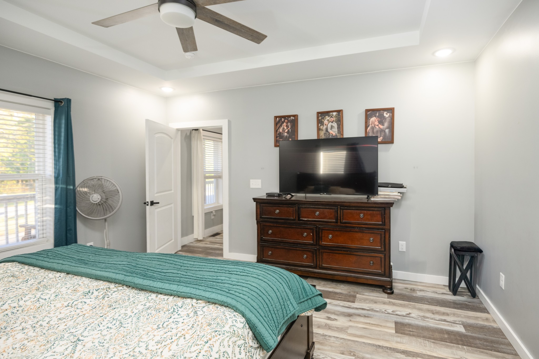 838 Old W Point Road Smithville, TN 37166 - Photo 34 of 65 a bedroom with a bed and a flat screen tv