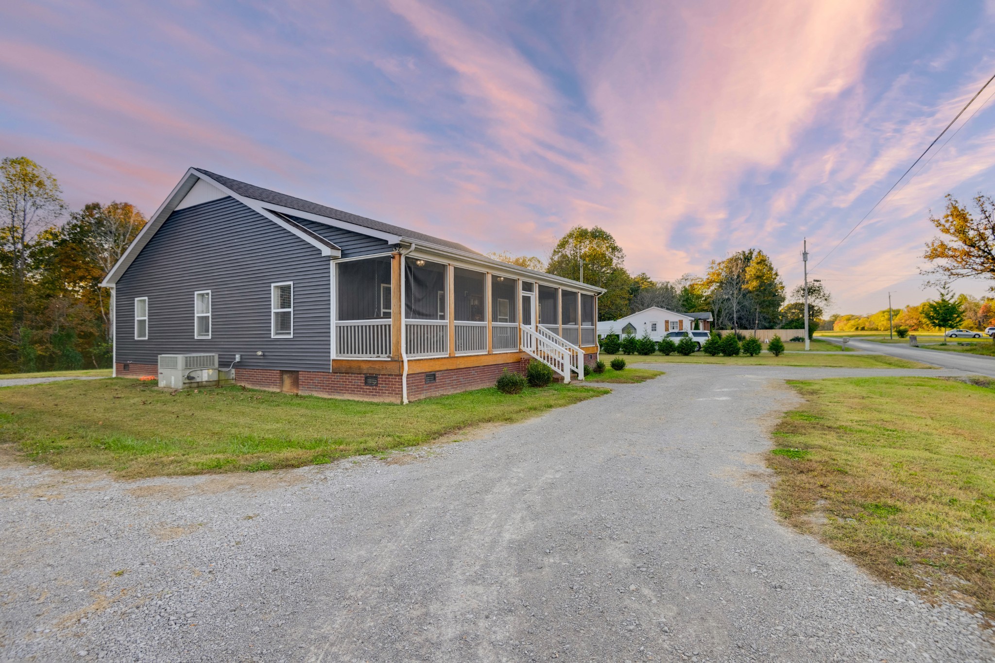 838 Old W Point Road Smithville, TN 37166 - Photo 5 of 65 a front view of a house with a yard and lake view