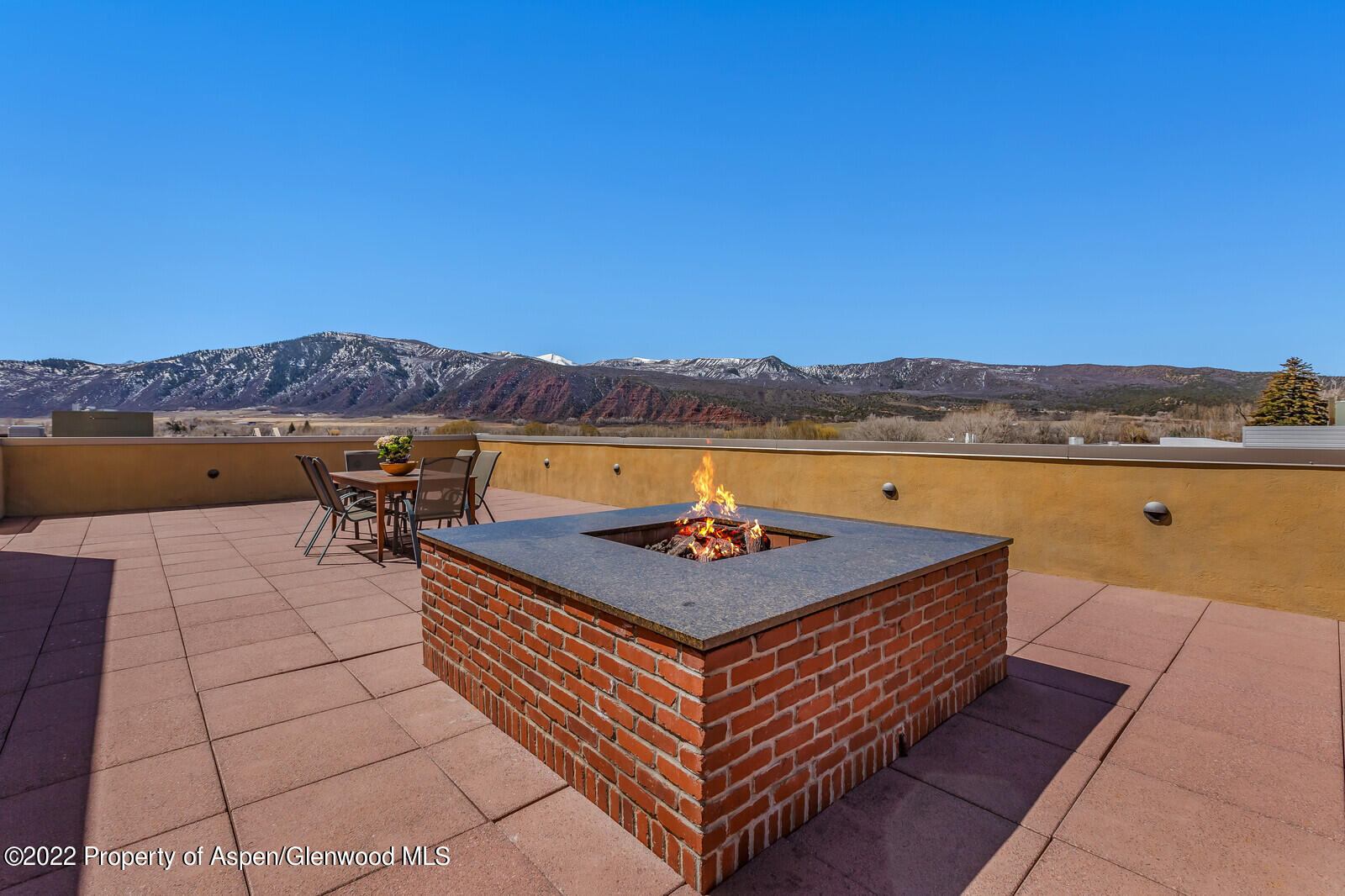 231 Robinson Street, Unit 312 Basalt, CO 81621 - Photo 18 of 25 a view of a terrace with furniture and a lake view