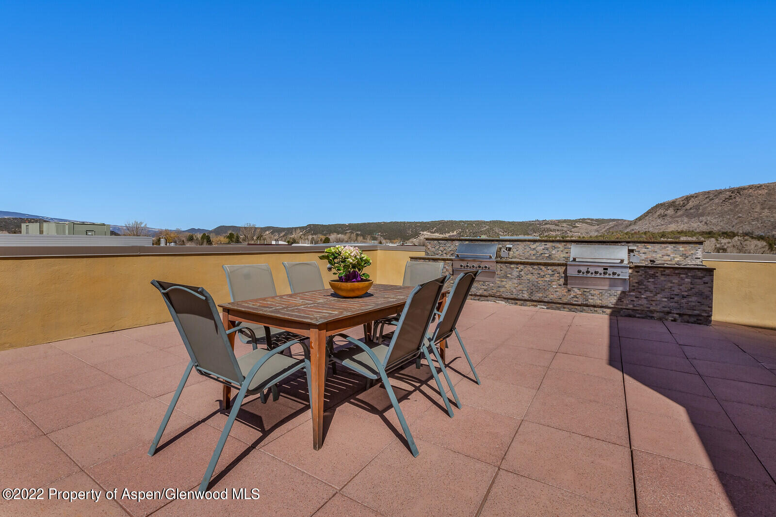 231 Robinson Street, Unit 312 Basalt, CO 81621 - Photo 20 of 25 a view of a terrace with furniture and stove