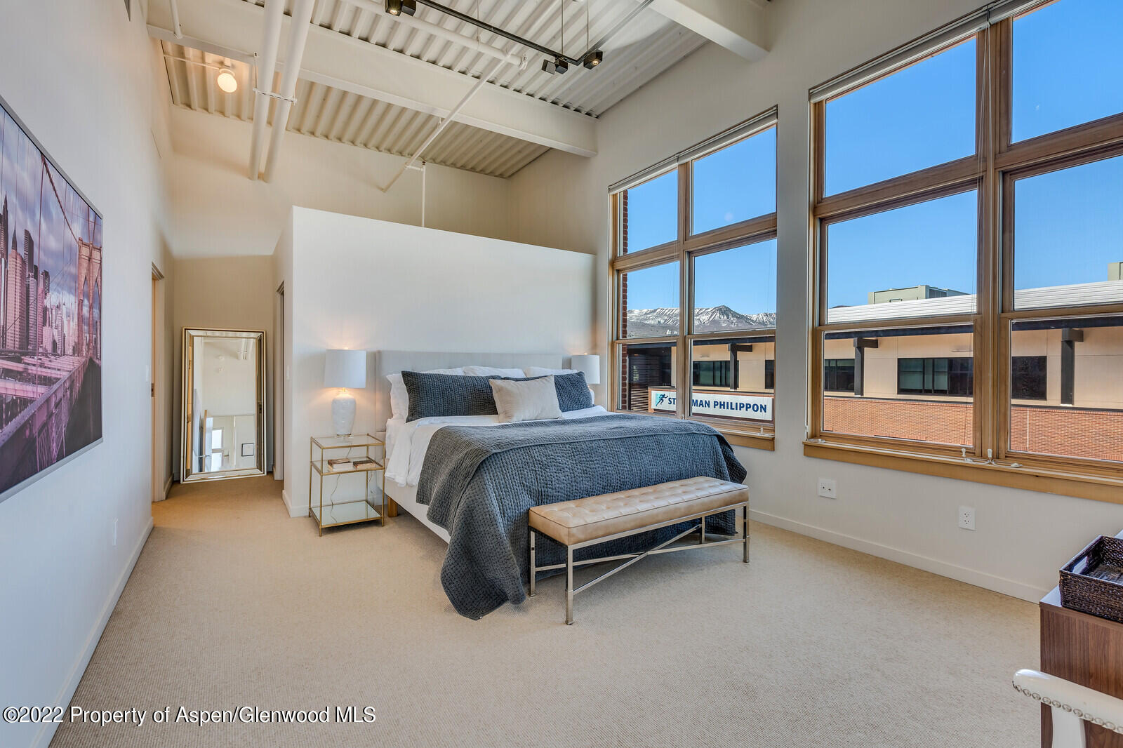 231 Robinson Street, Unit 312 Basalt, CO 81621 - Photo 9 of 25 a bedroom with a bed and a window