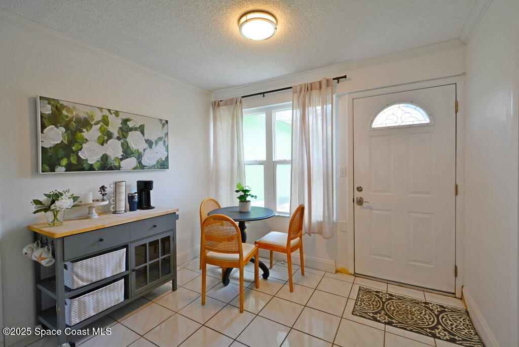 15 Hardee Circle South Rockledge, FL 32955 - Photo 11 of 44 a dining room with furniture and window