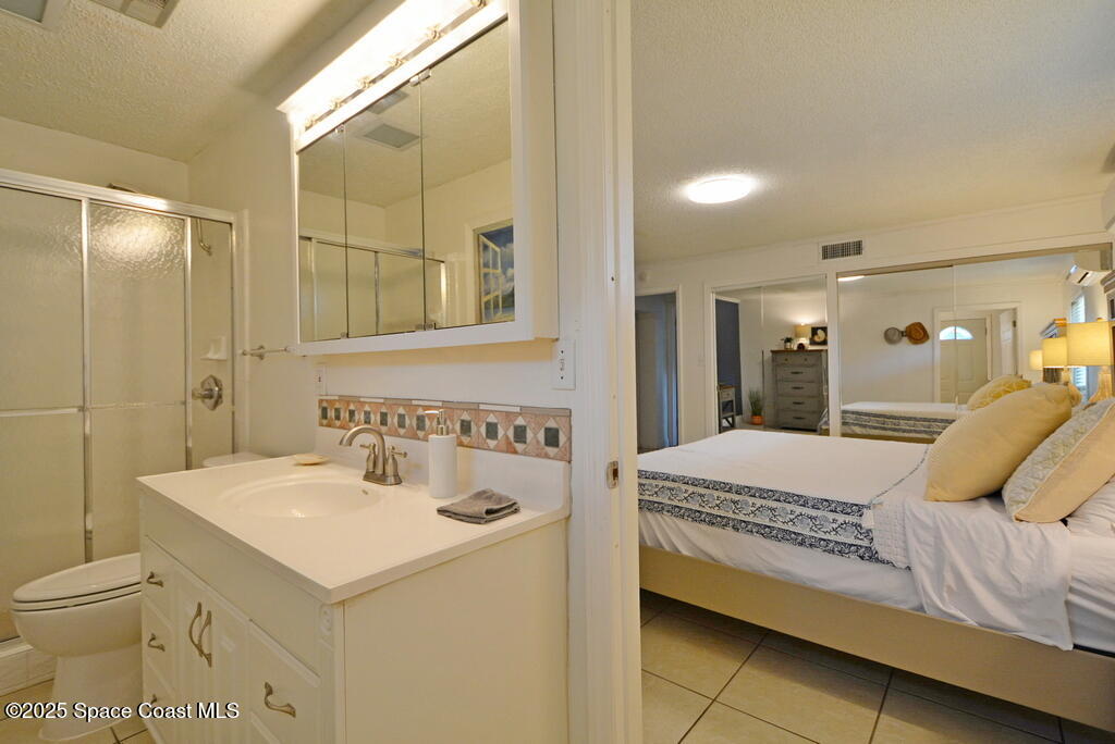 15 Hardee Circle South Rockledge, FL 32955 - Photo 26 of 44 a bathroom with a sink toilet and shower
