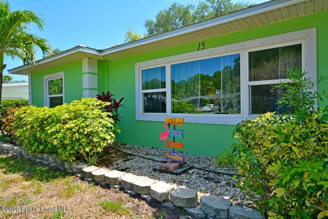 a house view with a garden space