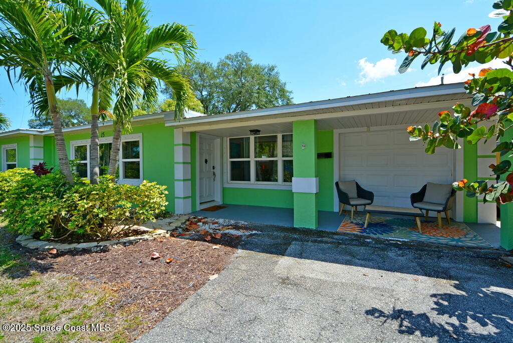 15 Hardee Circle South Rockledge, FL 32955 - Photo 35 of 44 a view of a house with a yard and sitting area