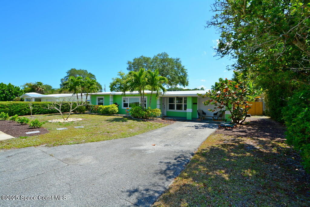 15 Hardee Circle South Rockledge, FL 32955 - Photo 38 of 44 a view of backyard with outdoor seating and green space