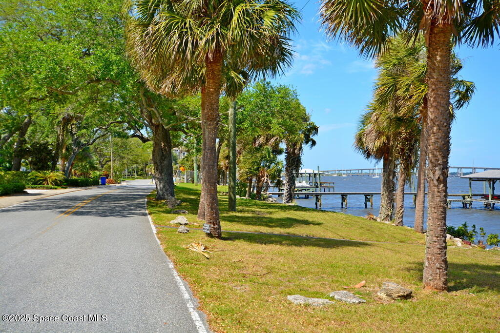 15 Hardee Circle South Rockledge, FL 32955 - Photo 42 of 44 a swimming pool with trees in front of it