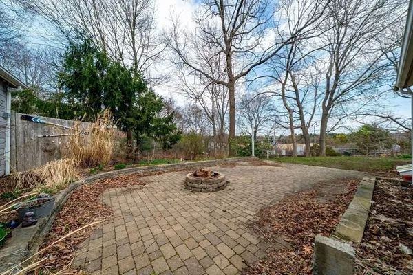 a backyard of a house with trees