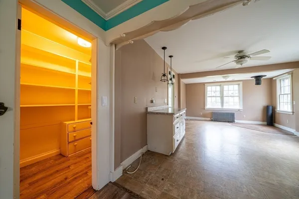 a view of a windows and cabinet in a room