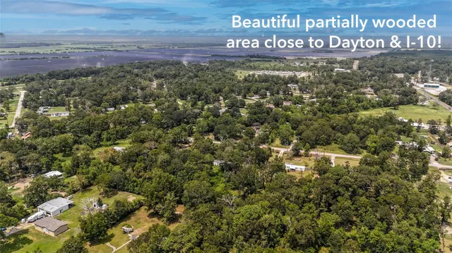 a view of outdoor space with signage and flags
