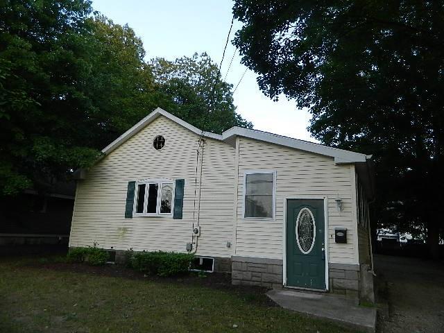 11 Sackett Point Road North Haven, CT 06473 - Photo 1 of 1 a view of a back yard of the house and green space