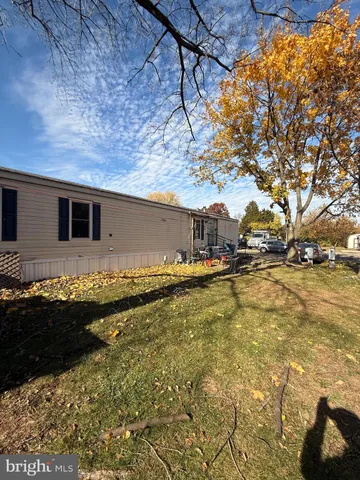 a view of swimming pool with yard