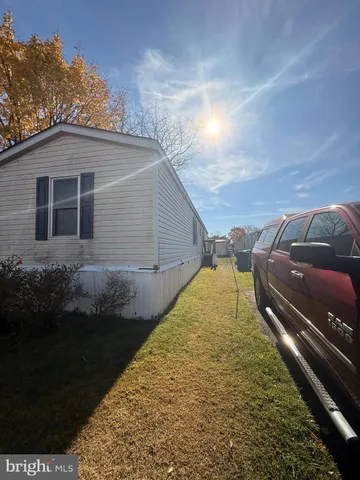 a view of backyard with garage
