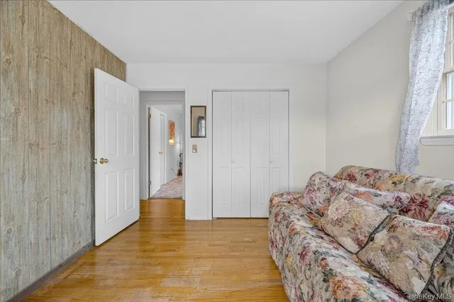 a view of a storage area with lots of furniture