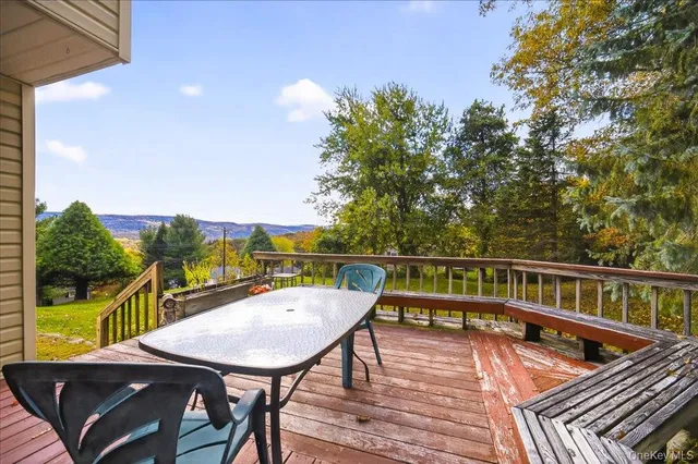 a view of balcony with furniture
