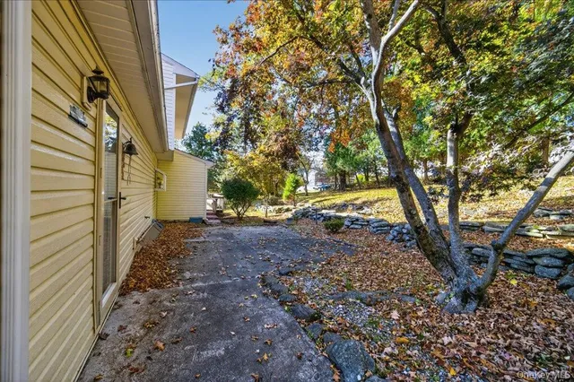 a aerial view of a house with a yard