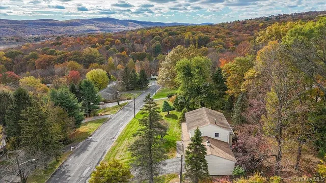 an aerial view of residential house with outdoor space