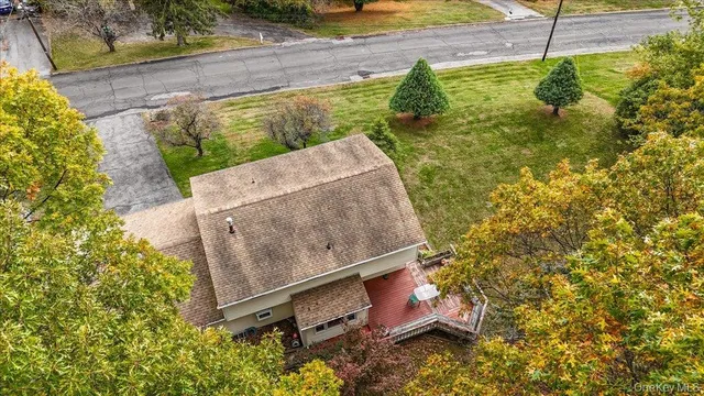 a view of a yard with a lake view