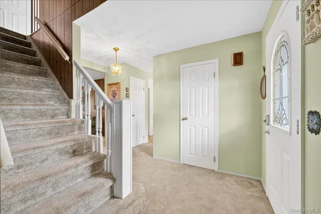 a view of an entryway with staircase