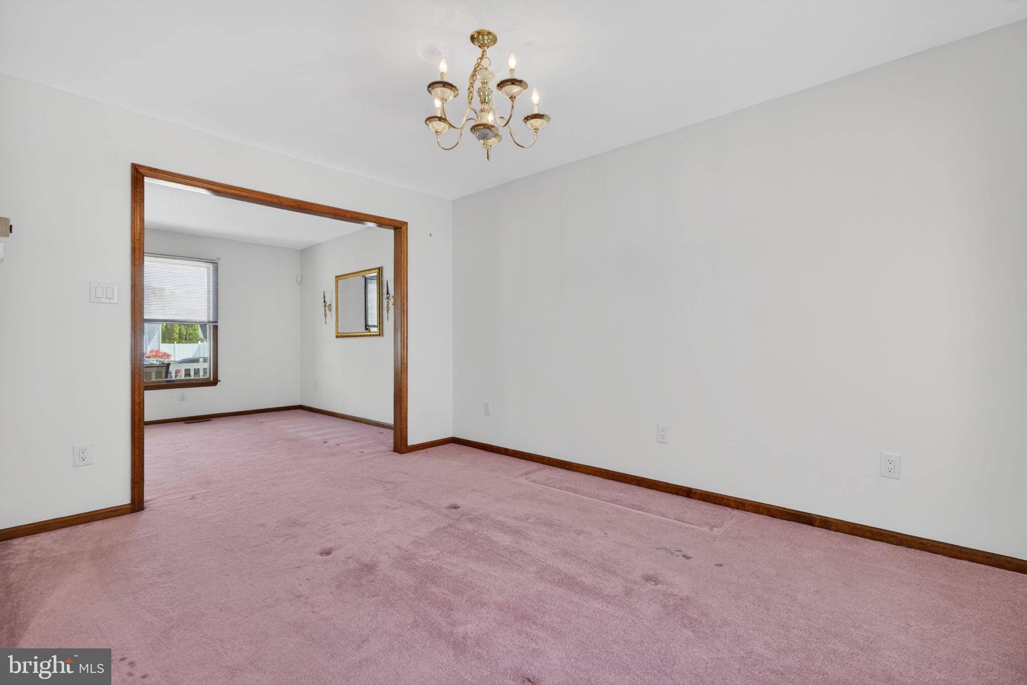 504 Ash Street Glassboro, NJ 08028 - Photo 11 of 42 an empty room with windows