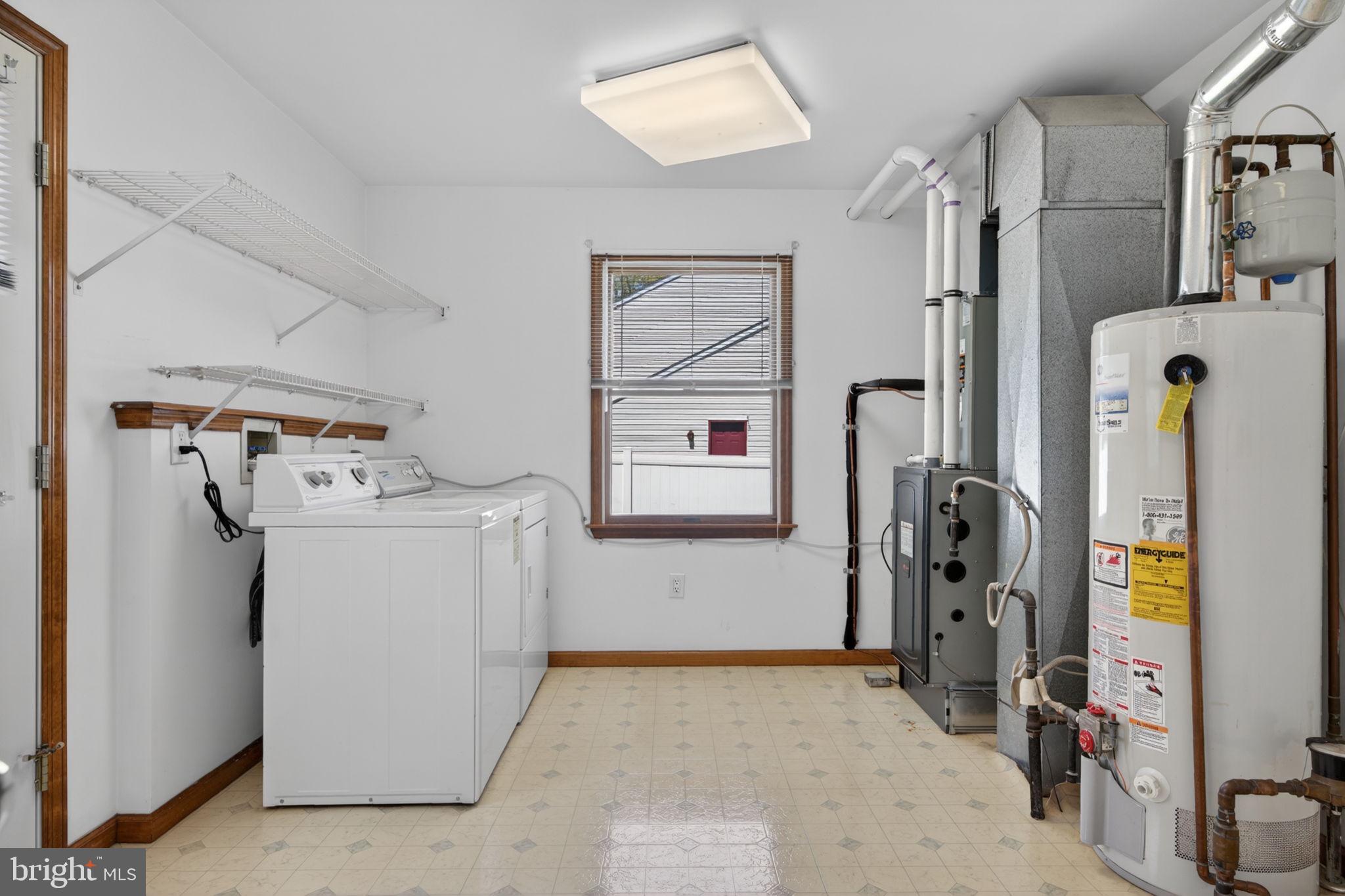 504 Ash Street Glassboro, NJ 08028 - Photo 20 of 42 a utility room with refrigerator and washer