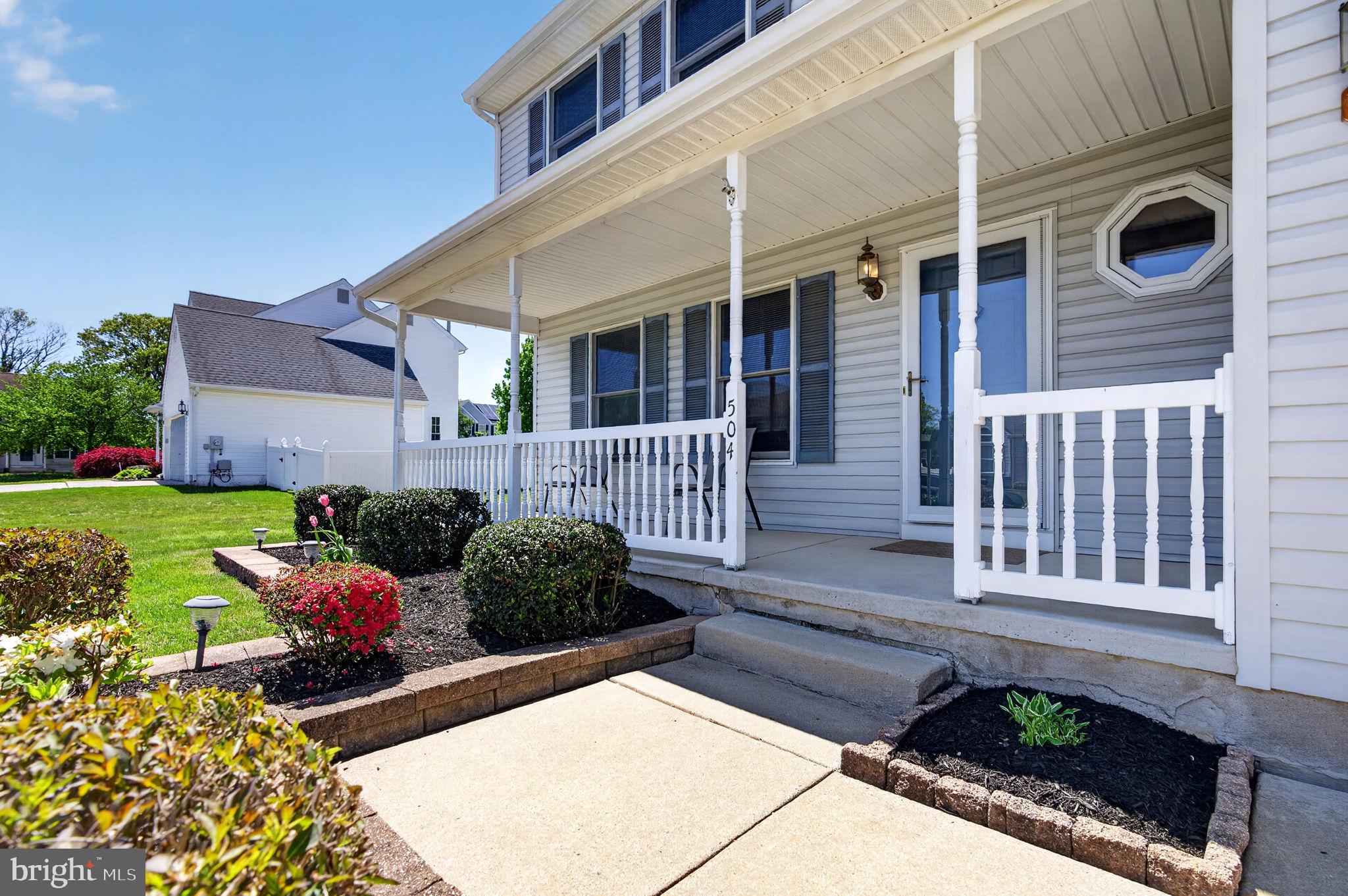 504 Ash Street Glassboro, NJ 08028 - Photo 3 of 42 a front view of a house with garden