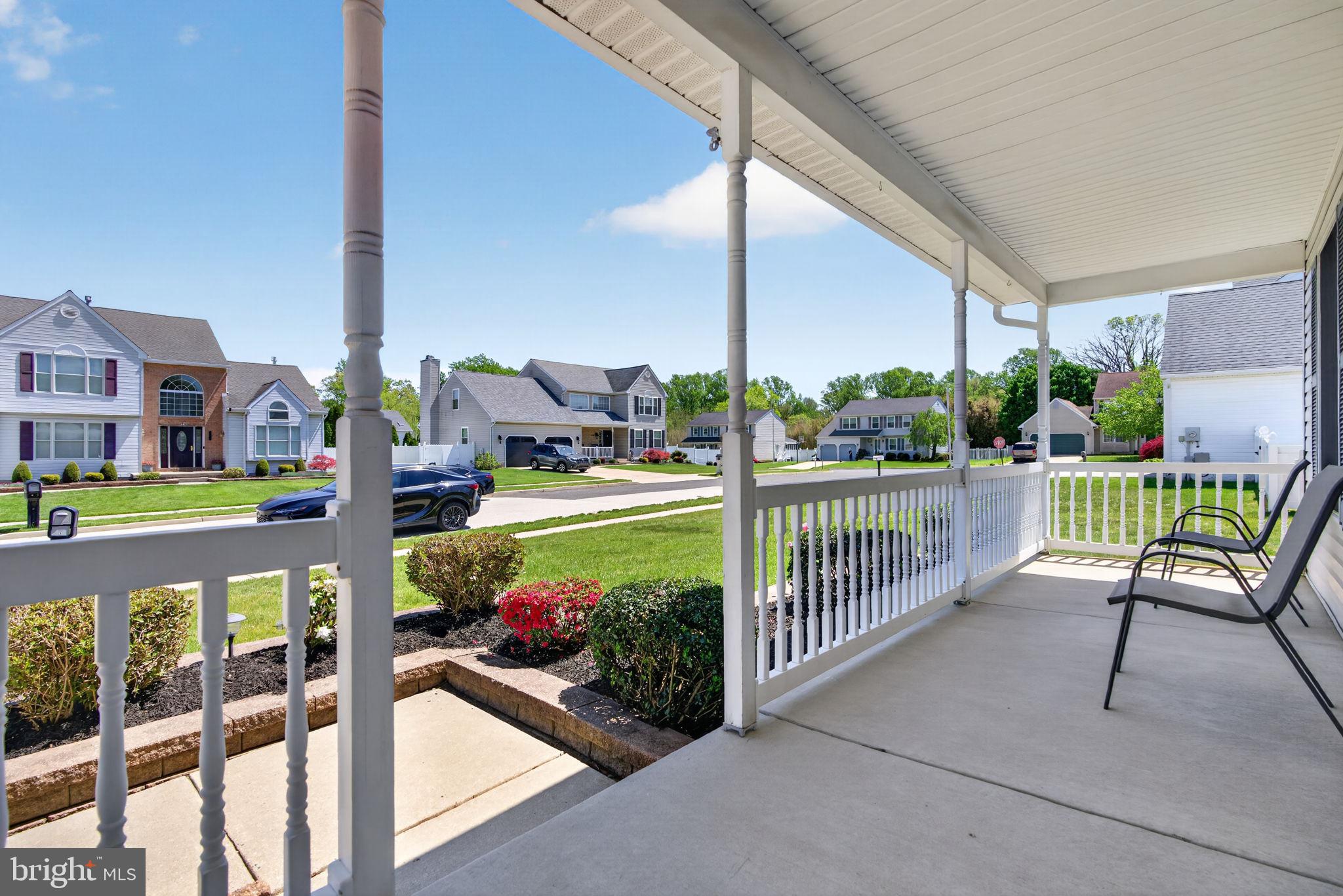 504 Ash Street Glassboro, NJ 08028 - Photo 4 of 42 a view of a balcony with outdoor seating