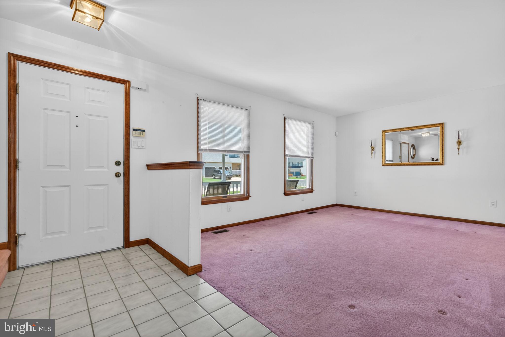 504 Ash Street Glassboro, NJ 08028 - Photo 6 of 42 an empty room with windows and closet