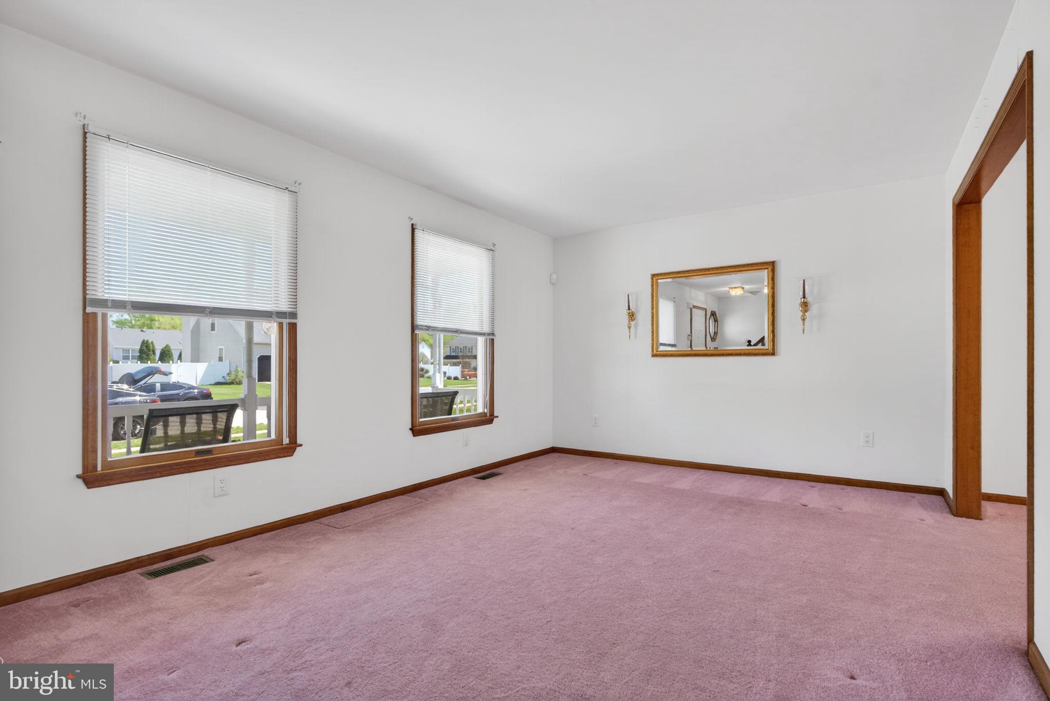 504 Ash Street Glassboro, NJ 08028 - Photo 7 of 42 a view of an empty room with a window